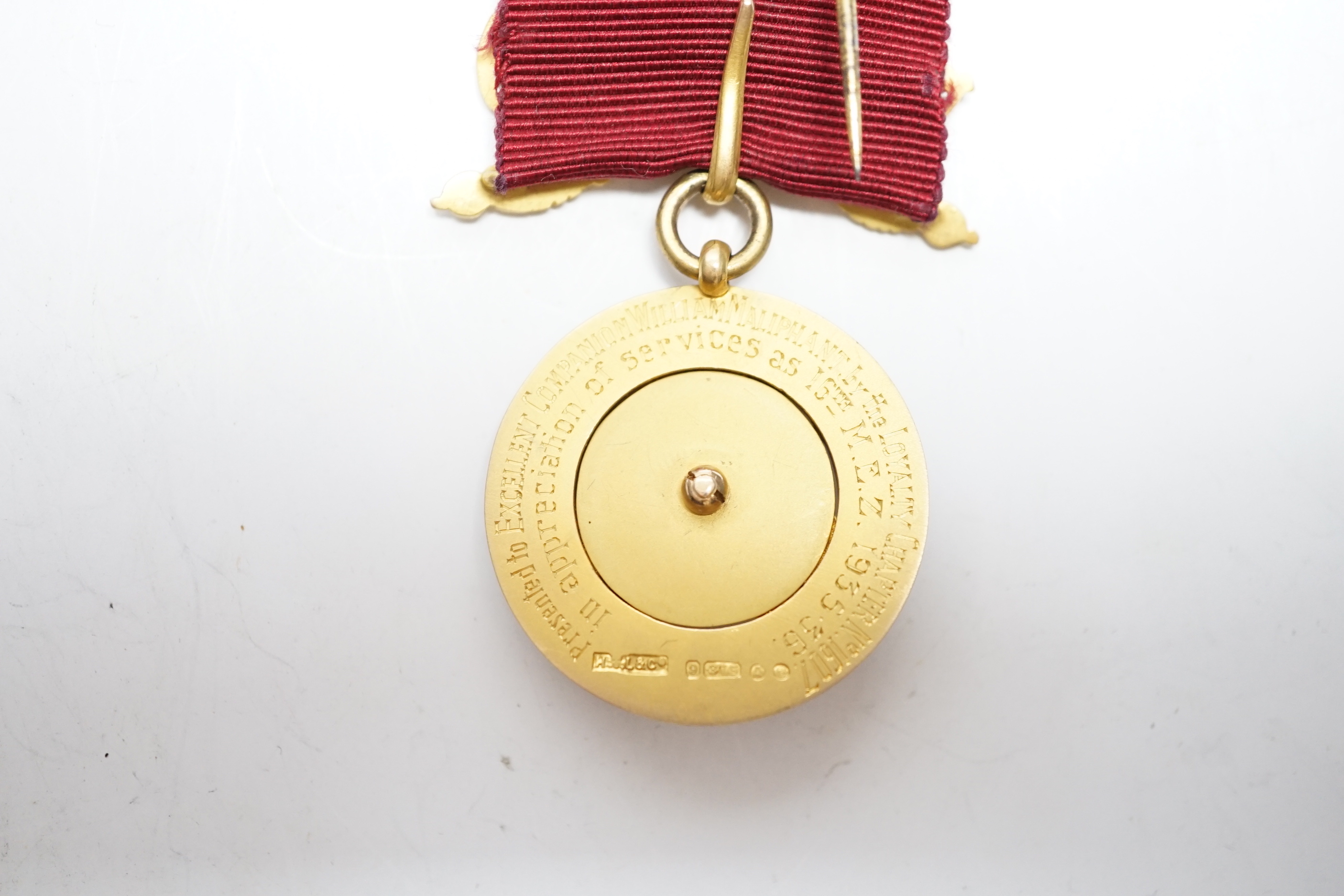 A 1930's part 9ct gold and enamelled Masonic jewel, 11cm, gross weight 33 grams.